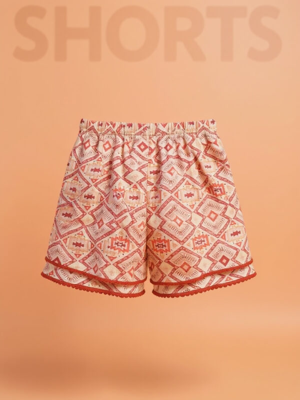 Orange patterned girls shorts - Image 2