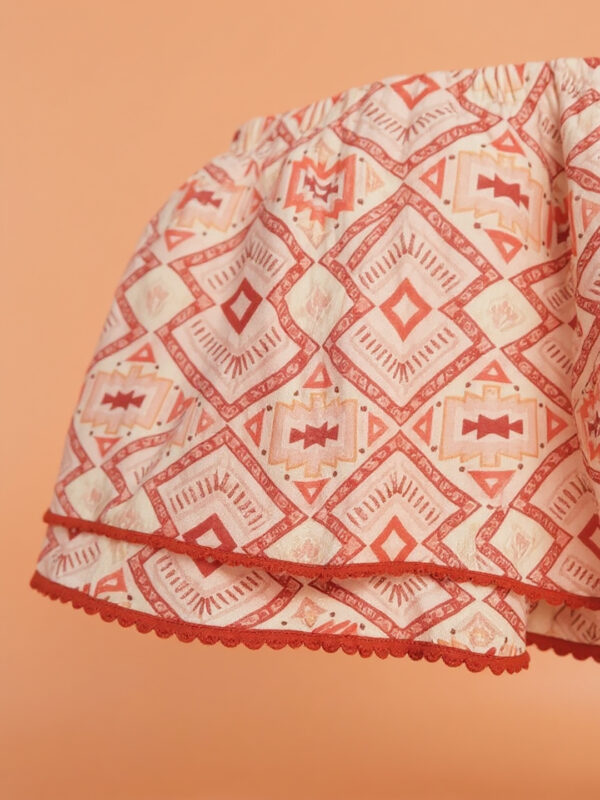 Orange patterned girls shorts - Image 3